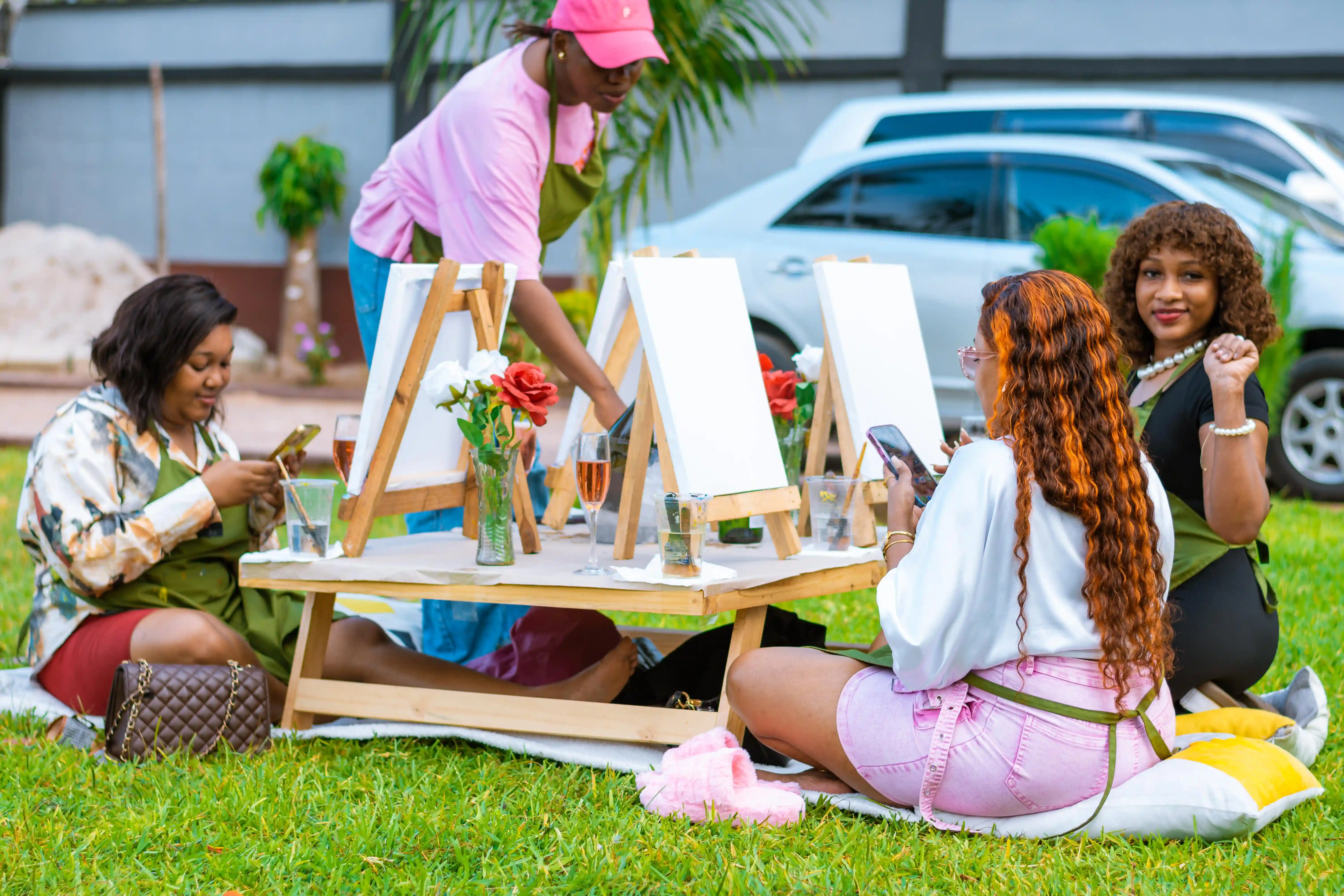 Paint and Sip Event at Nias Nyalada Art Studio - Group of people enjoying painting session with drinks